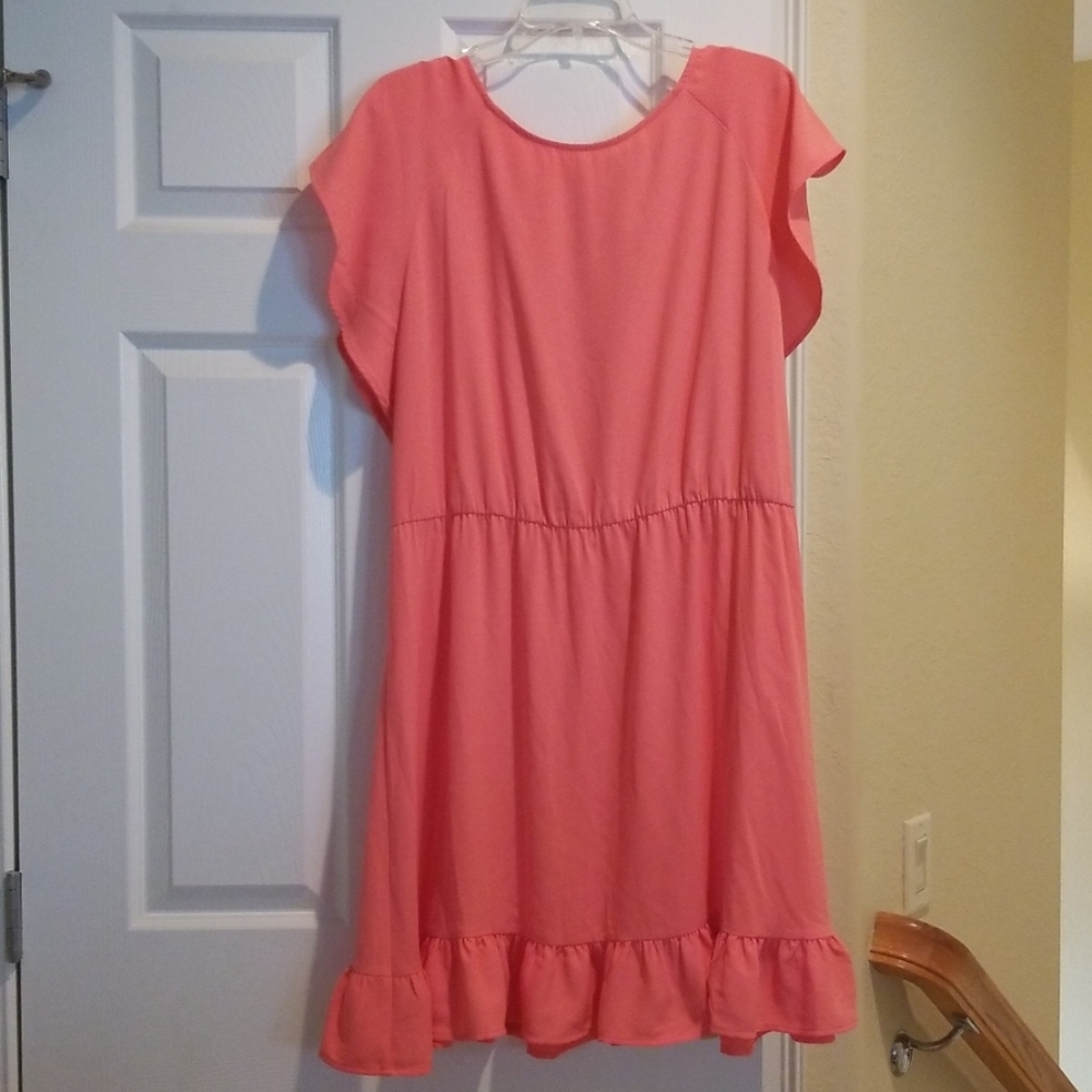 Deep coral dress.